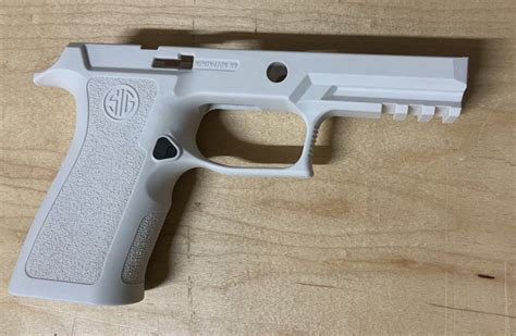 The design retains enough smoothness in areas to allow the weapon to move against clothing. . Sig p320 white grip module